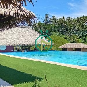 Synthetic palm leaf thatch roof